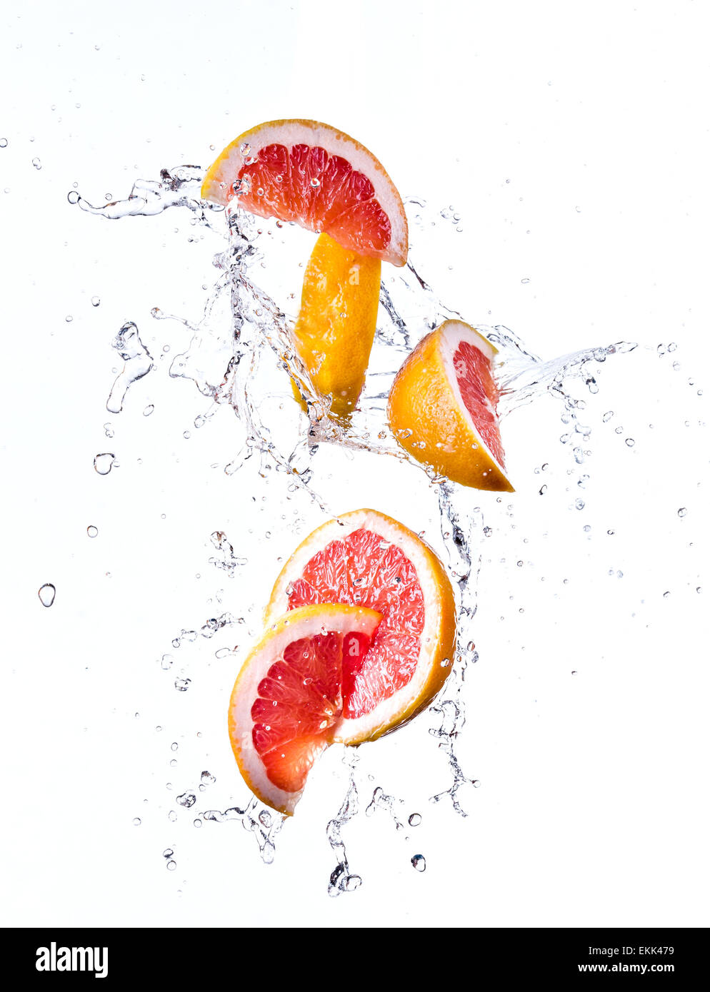 Grapefruit with water splash isolated on white Stock Photo Alamy