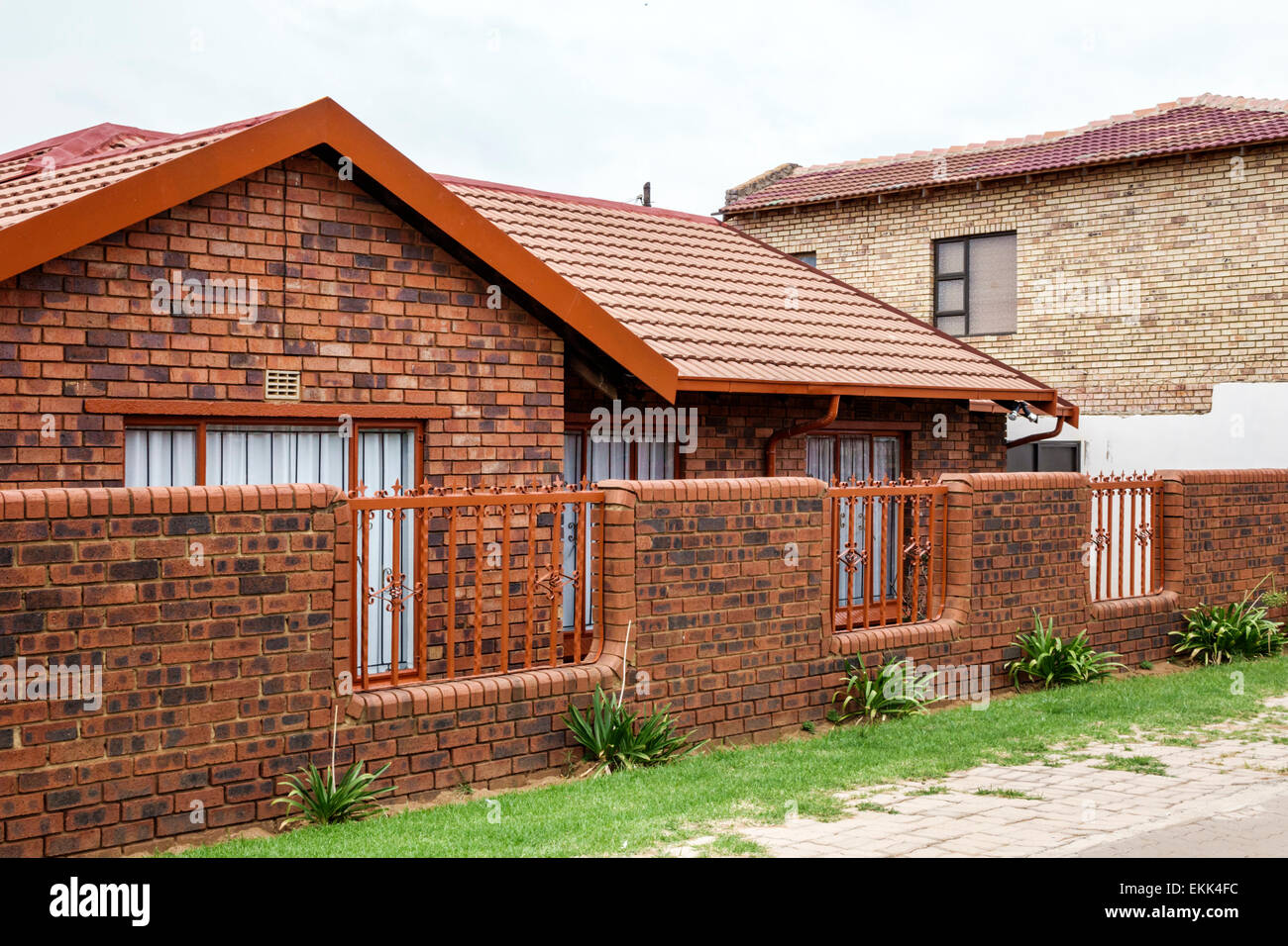 Johannesburg South Africa,African Soweto,house houses home houses homes residence,home,brick wall,visitors travel traveling tour tourist tourism landm Stock Photo