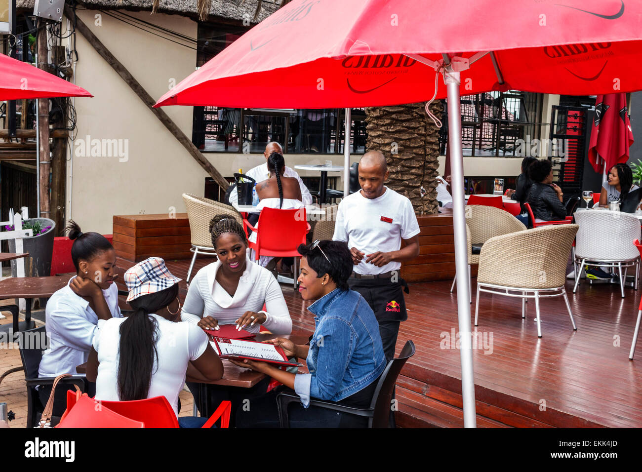 Johannesburg South Africa,Soweto,Vilakazi Street Precinct,Sakhumzi,restaurant restaurants food dining cafe cafes,table,al fresco sidewalk outside tabl Stock Photo
