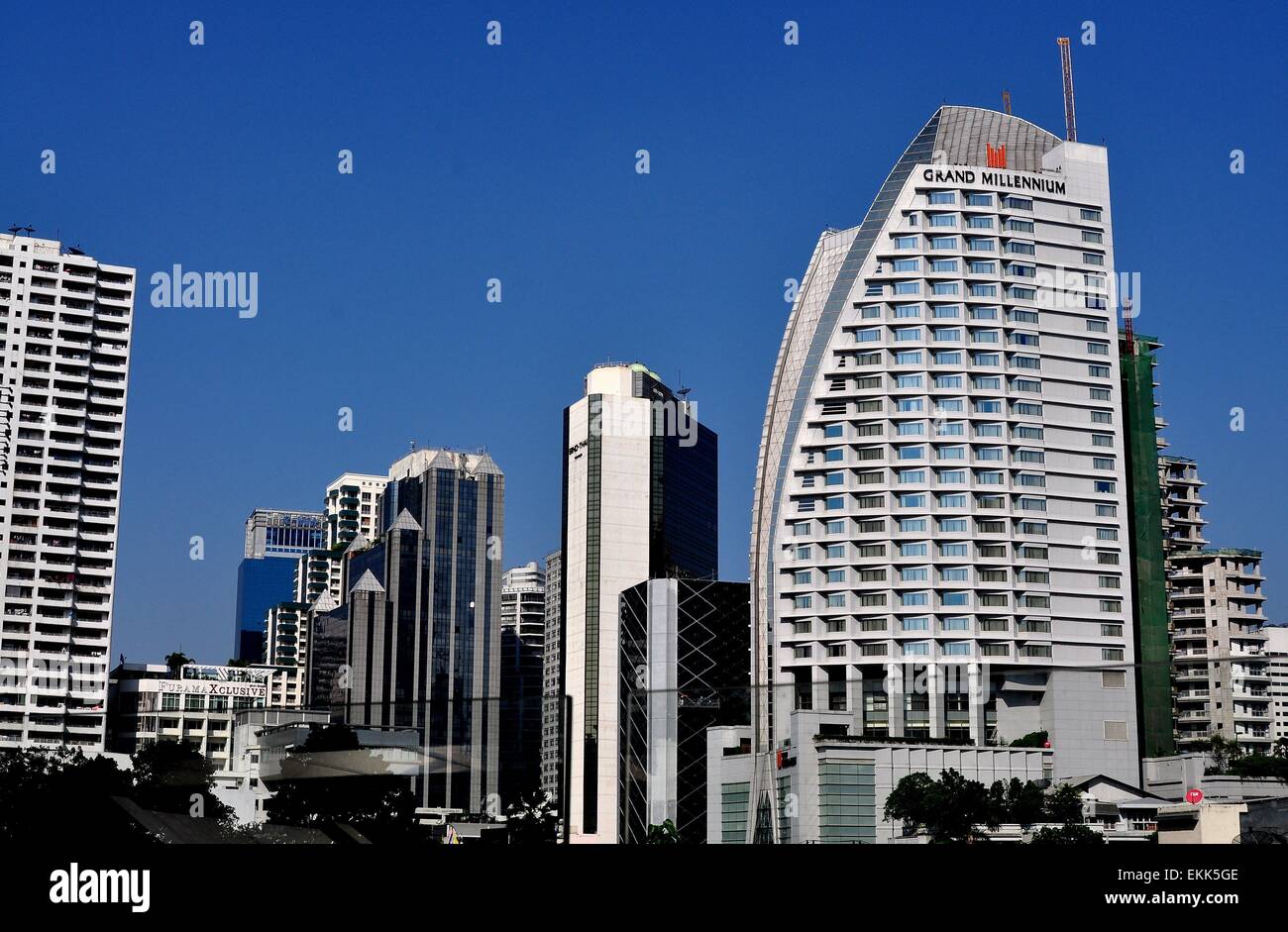 Bangkok Thailand View To Sukhamvit Road With The Grand Millenium Luxury Hotel And Modern High Rise Office Towers Stock Photo Alamy