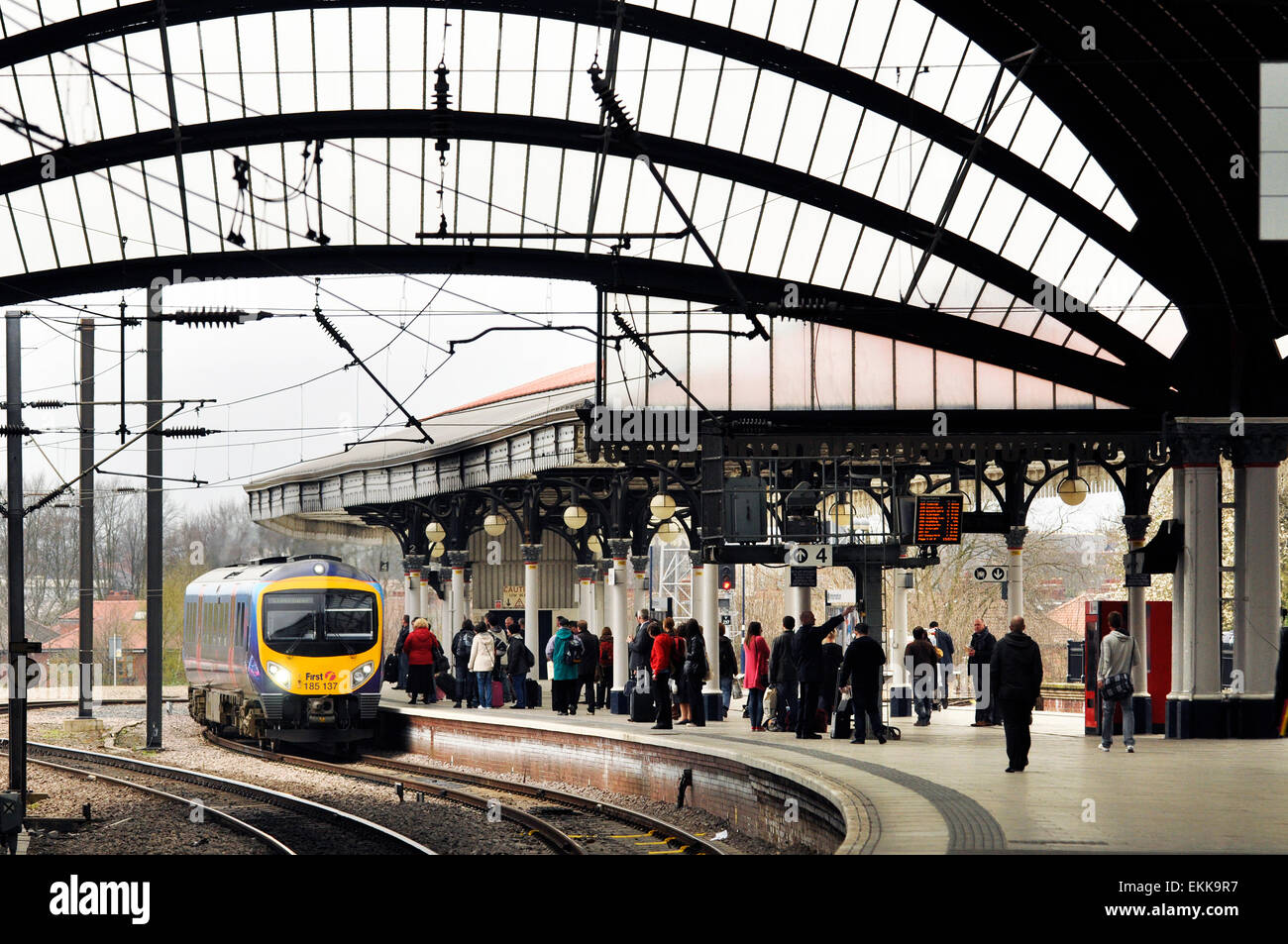 YORK, UK - APRIL 2010: Train of the FirstGroup, a British transport group, arrives at York Railway Station. Stock Photo