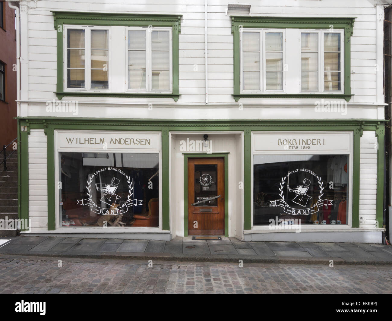 Old shop in central Stavanger Norway , traditional small white wooden  paneled house, bookbinder Stock Photo - Alamy