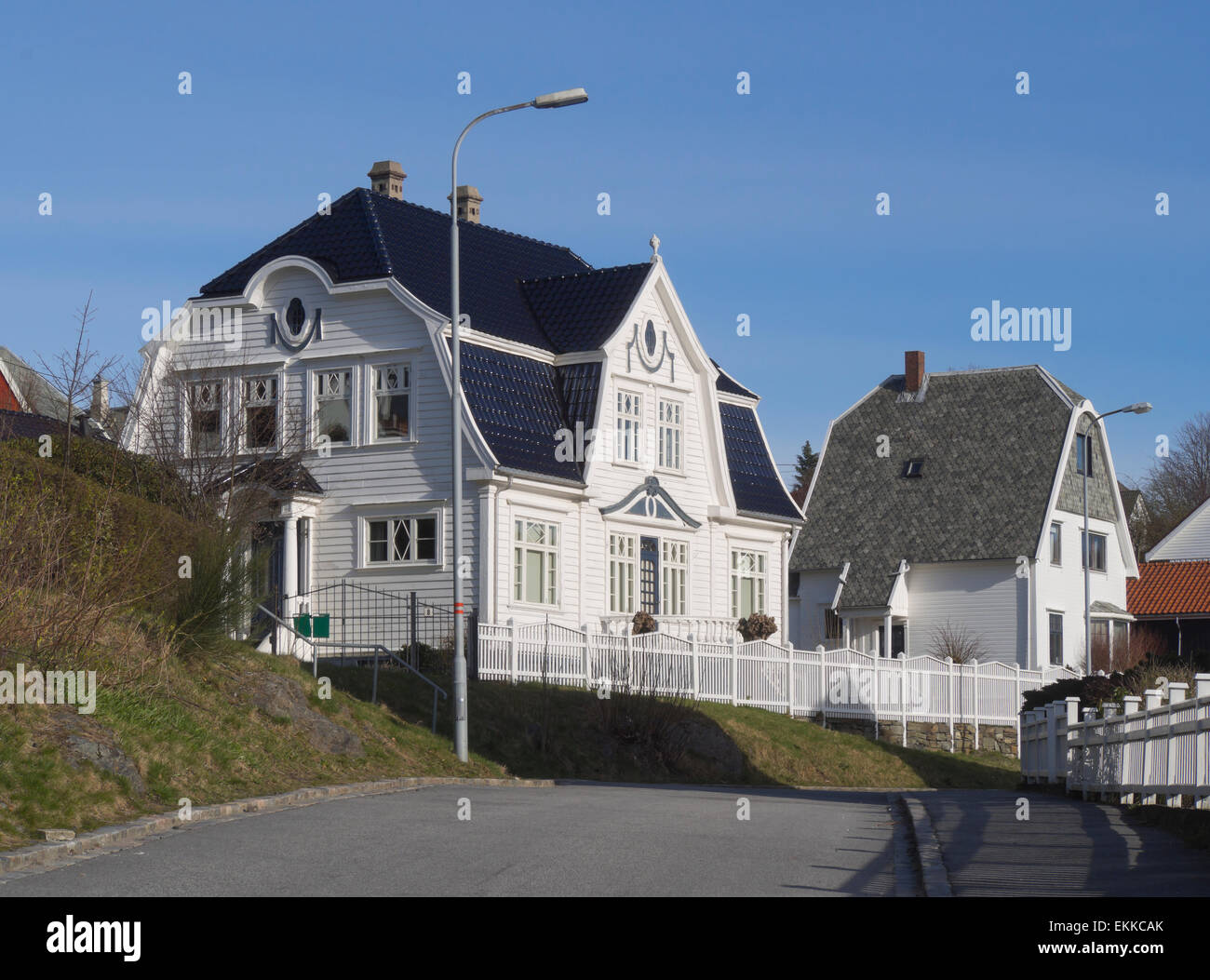 Large old wooden paneled villa in a residential area of Stavanger Norway Stock Photo