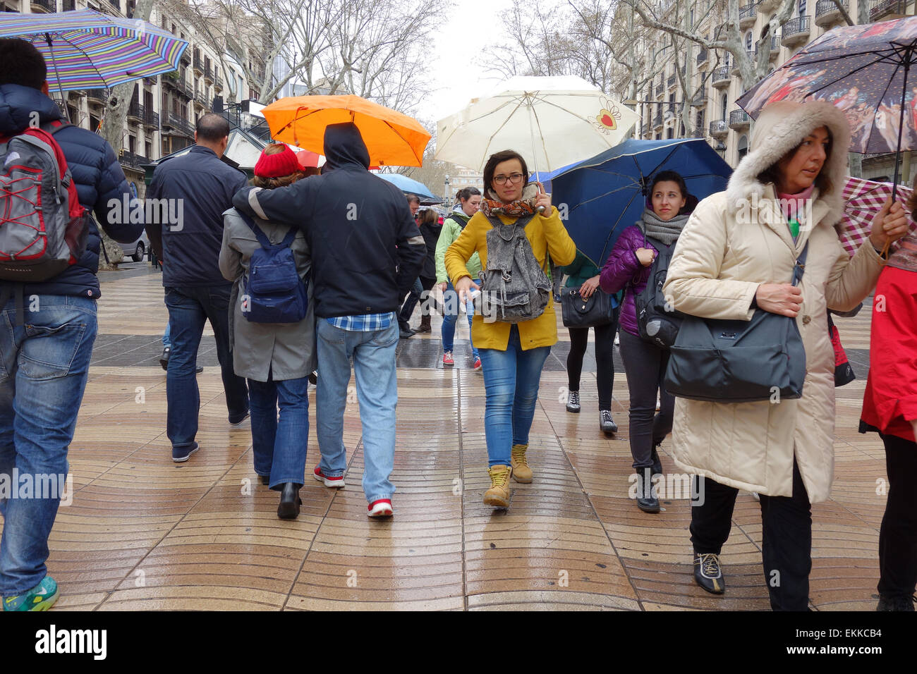 People with umbrellas on rainy day in Barcelona Stock Photo Alamy