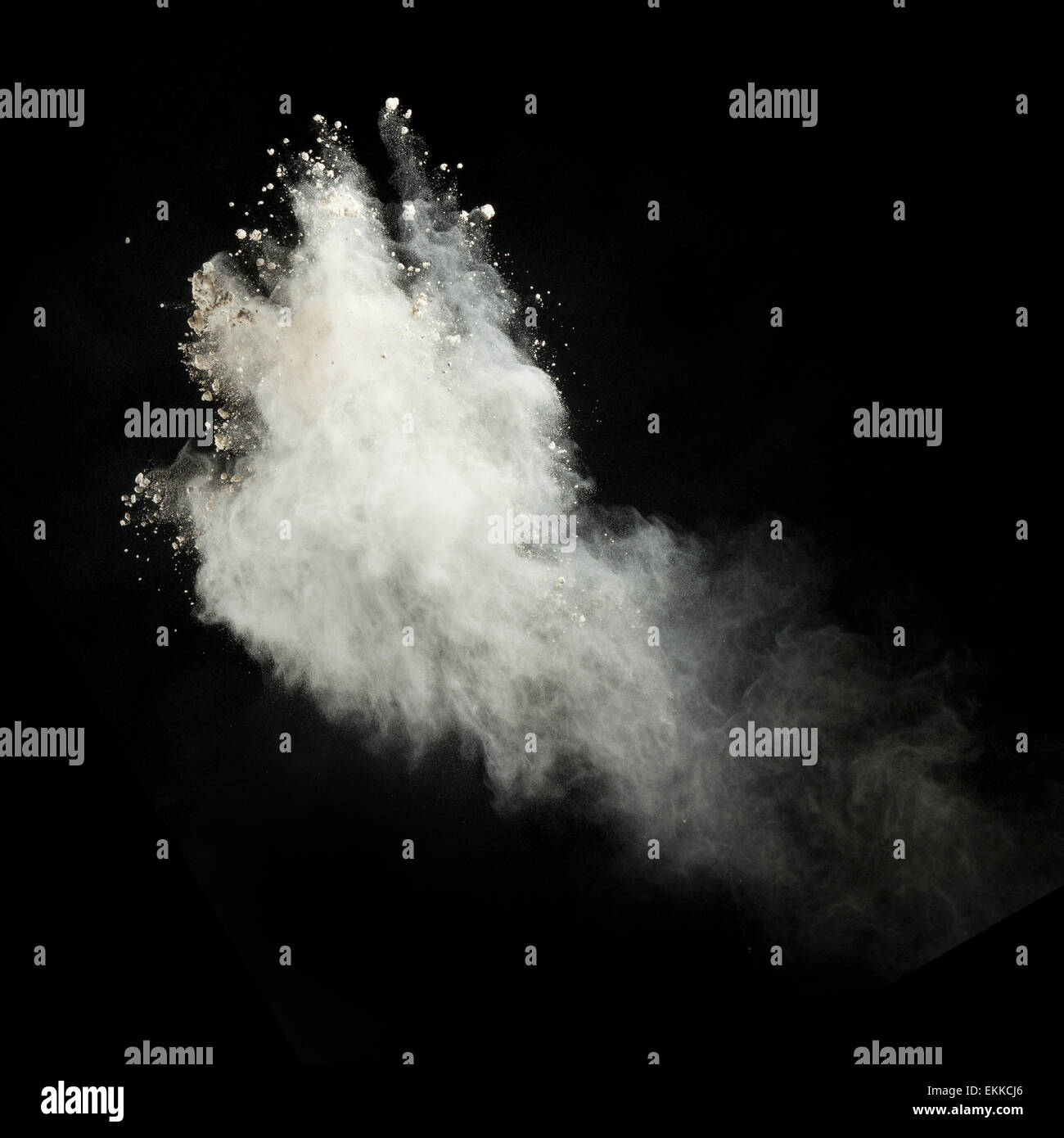 Launched colorful powder, isolated on black background Stock Photo - Alamy
