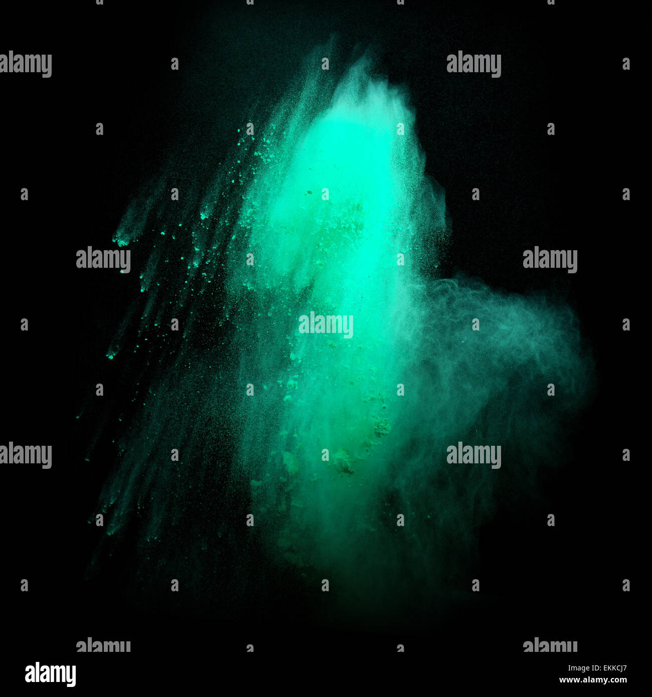 Launched colorful powder, isolated on black background Stock Photo - Alamy