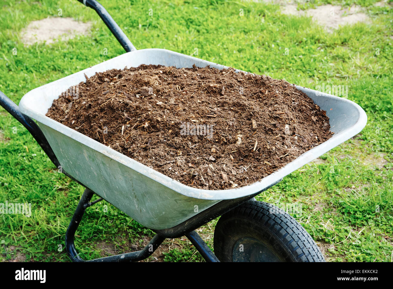 Wheelbarrow vegetable garden gardening hires stock photography and