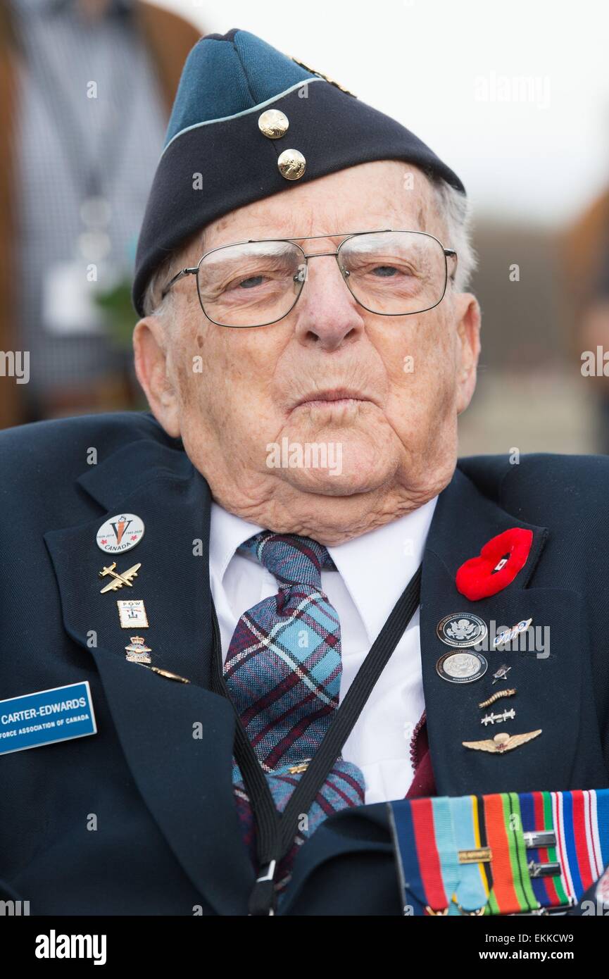 Weimar, Germany. 11th Apr, 2015. Former Canadian prisoner of Buchenwald concentration camp, Ed Carter-Edwards, stands on the parade ground of Buchenwald concentration camp during a commemorative event near Weimar, Germany, 11 April 2015. On 11 April 1945, US troops arrived at the camp which held 21,000 prisoners. PHOTO: SEBASTIAN KAHNERT/dpa/Alamy Live News Stock Photo