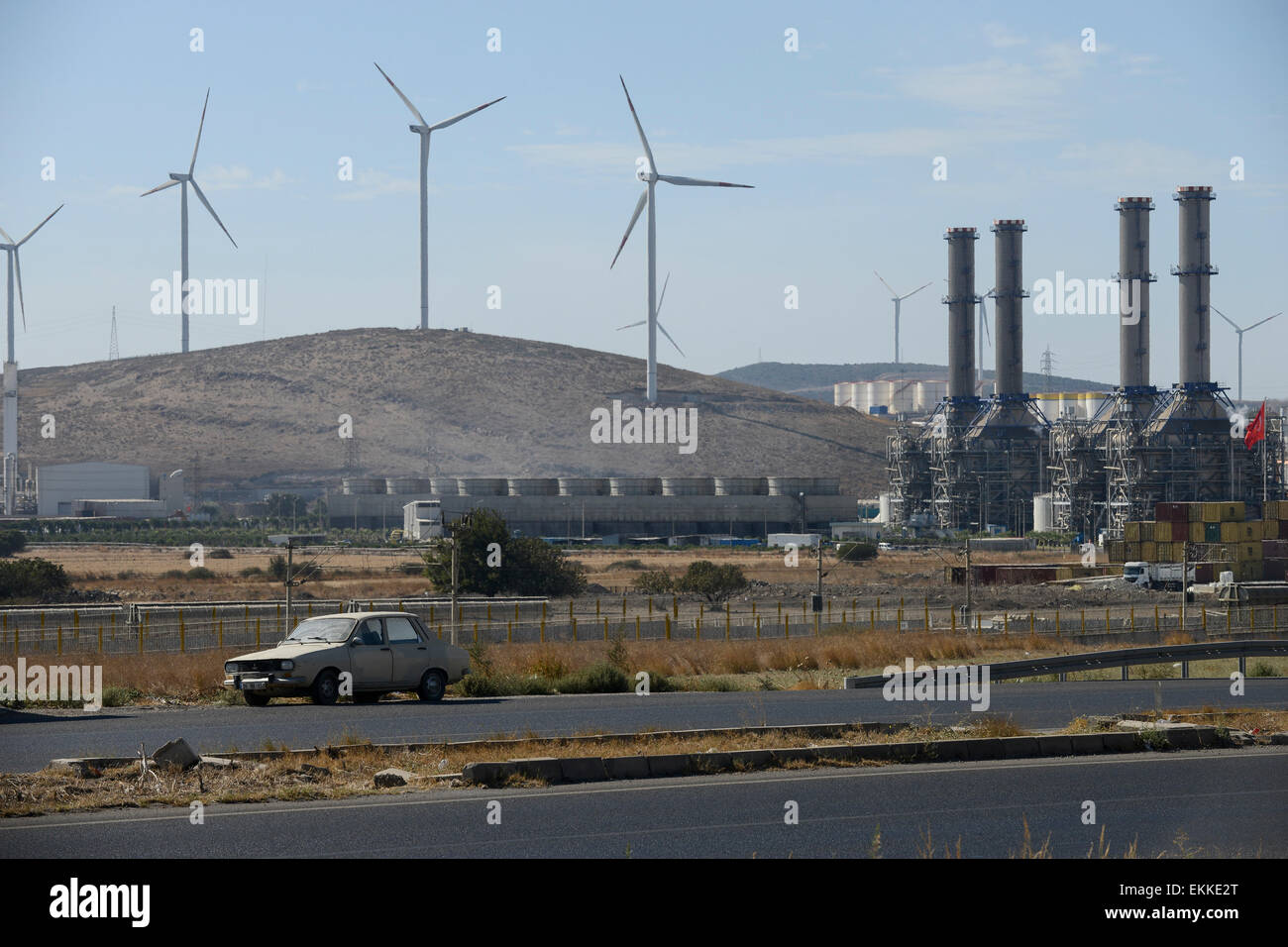 TURKEY Aliaga, Nordex N90 wind turbines and industrial plant at highway Izmir to Bergama Stock Photo