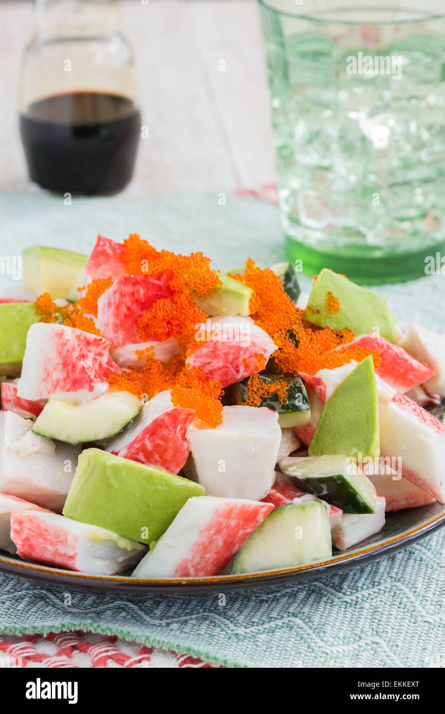 Deconstructed California roll poke made with imitation crab, cucumber