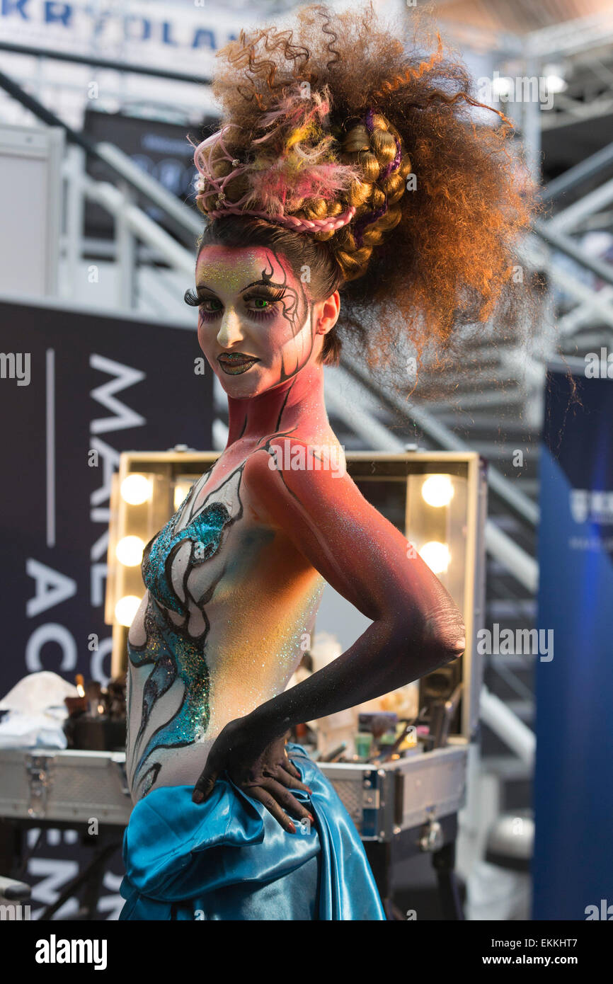 London, UK. 11 April 2015. Model Caroline Can displays a full bodypainting design by makeup