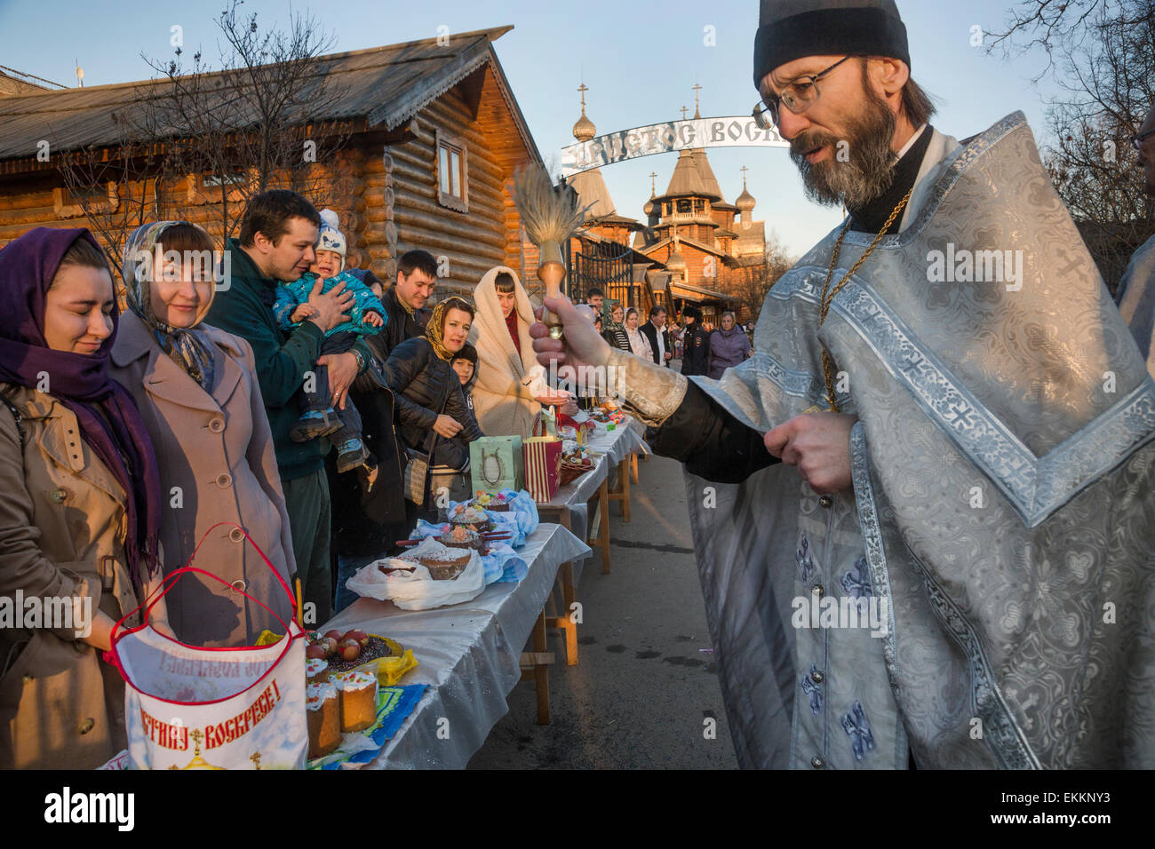 Moscow, Russia. 11 Apr, 2015. Consecration of Easter cakes on Easter Saturday near one of the wooden Church of Moscow, Russia Credit:  Nikolay Vinokurov/Alamy Live News Stock Photo