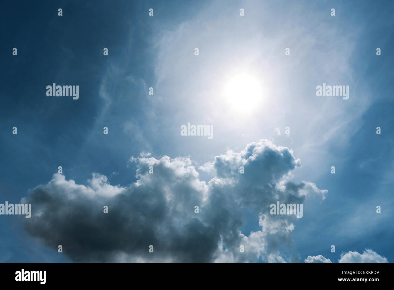 background blue sky with clouds and sun Stock Photo