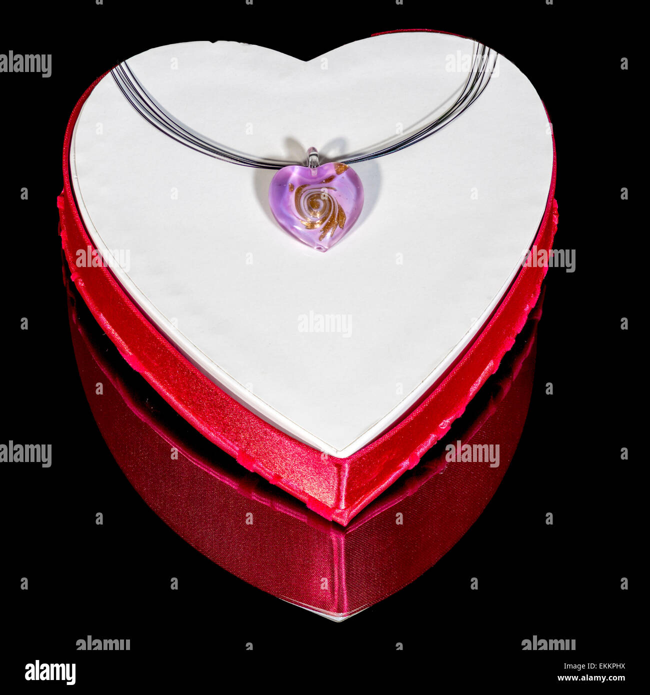 Heart necklace on a Valentine candy box Stock Photo