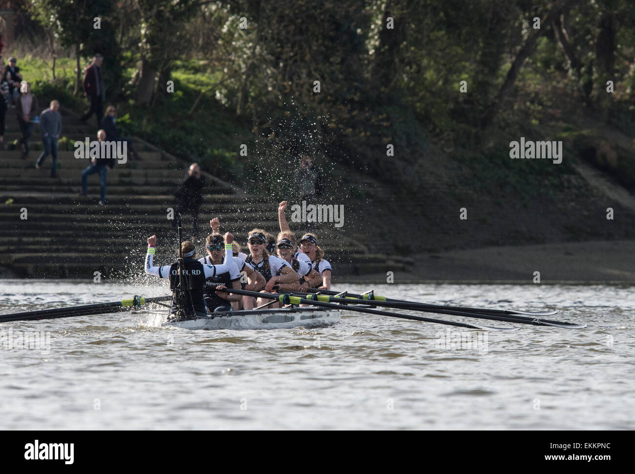 London, UK. 11th April, 2015. Oxford University Women's Boat Club (OUWBC) [dark blue] and Cambridge University Women's Boat Club (CUWBC) [light blue] make history by competing in the first ever women’s race to be held on the traditional Men’s Tideway course between Putney and Mortlake.  OUWBC crew:- Bow: Maxie Scheske, 2: Anastasia Chitty, 3: Shelley Pearson, 4: Lauren Kedar, 5: Maddy Badcott, 6: Emily Reynolds, 7: Nadine Graedel Iberg, Stroke: Caryn Davies, Cox: Jennifer Her. Credit:  Duncan Grove/Alamy Live News Stock Photo