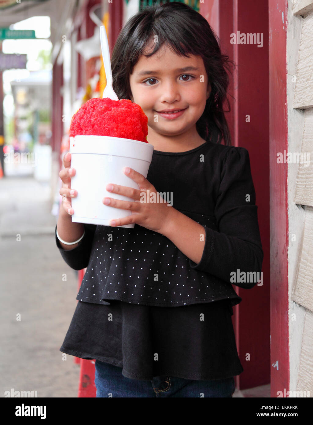 Child with shave ice in Lahaina, Maui Stock Photo
