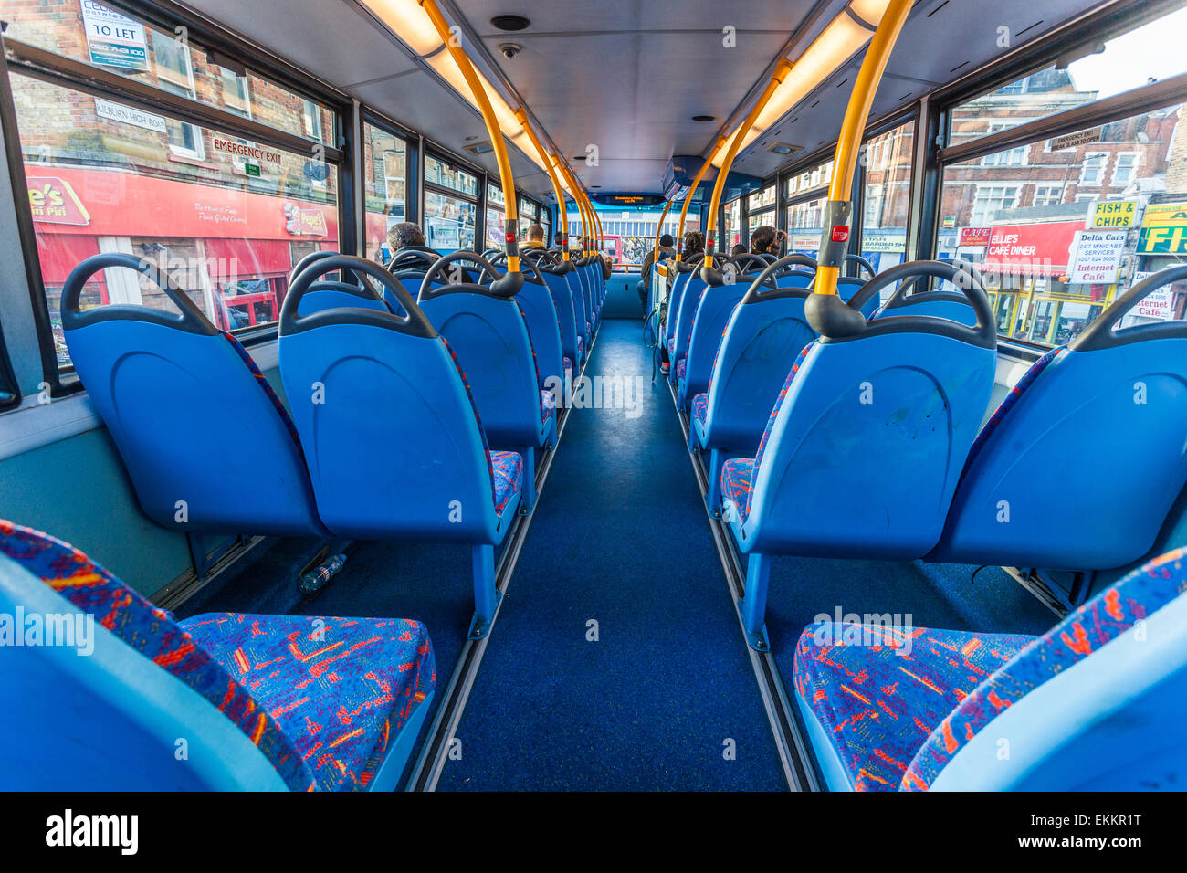 Rear view of empty seats on the upper deck of a double decker bus, London, England, UK Stock Photo