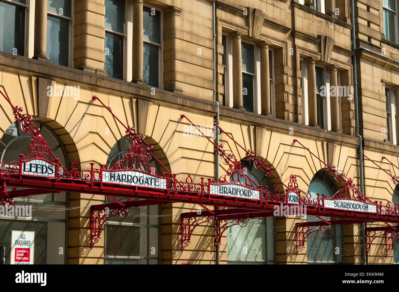 Newly restored wrought iron and leaded glass destination signs on the canopy of Victoria Station, Manchester, England, UK Stock Photo