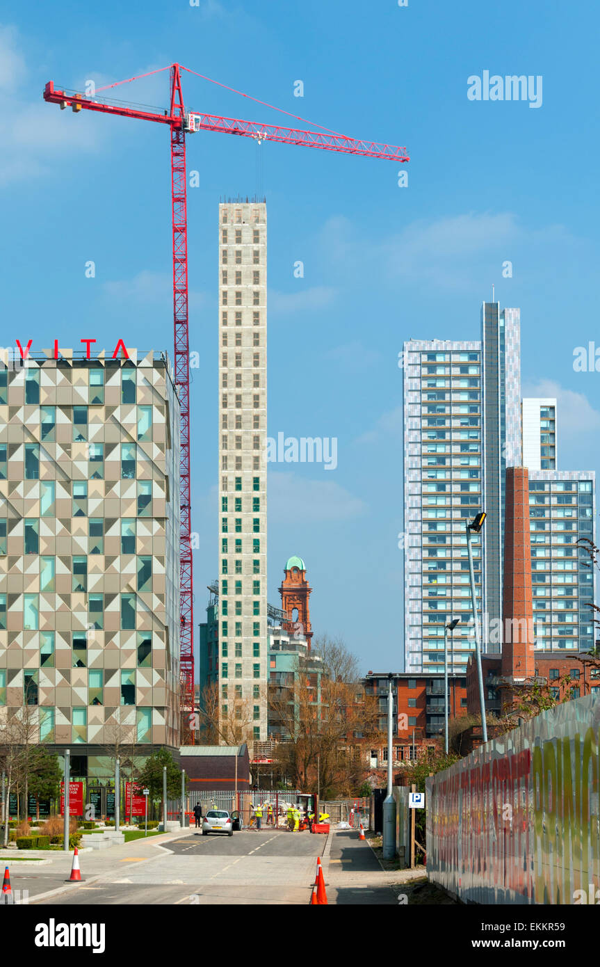 Vita student apartments (left) and the Student Castle building (right), from James Grigor Square, First Street, Manchester, England, UK Stock Photo