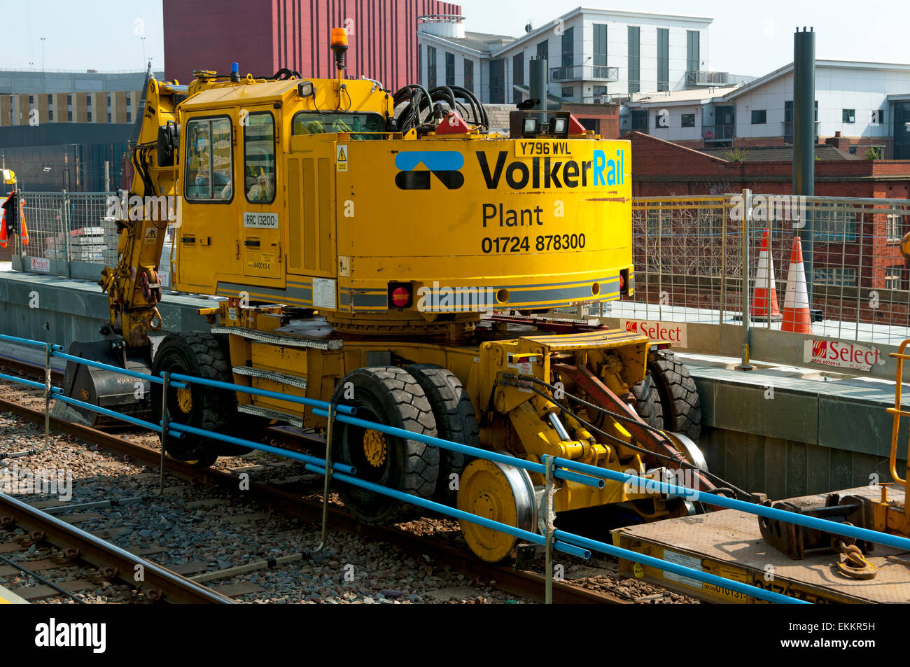 Volker Rail road-rail vehicle type RRC13200 at the Deansgate-Castlefield Metrolink tram stop, Manchester, England, UK Stock Photo