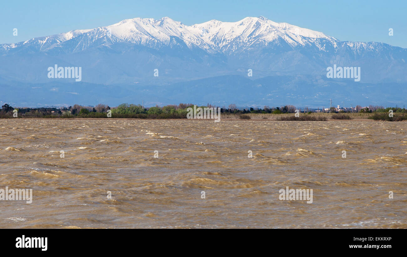 Mount Canigou from the coastal lagoon of Canet-Saint Nazarie in Languedoc-Roussillon, France. Stock Photo