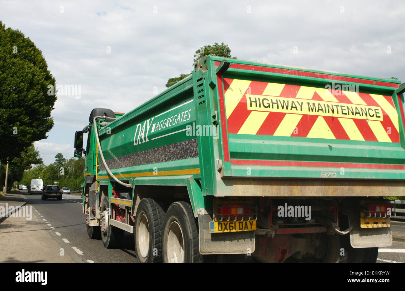 A truck and other traffic traveling along the A23 road in Coulsdon, Surrey, England. Stock Photo
