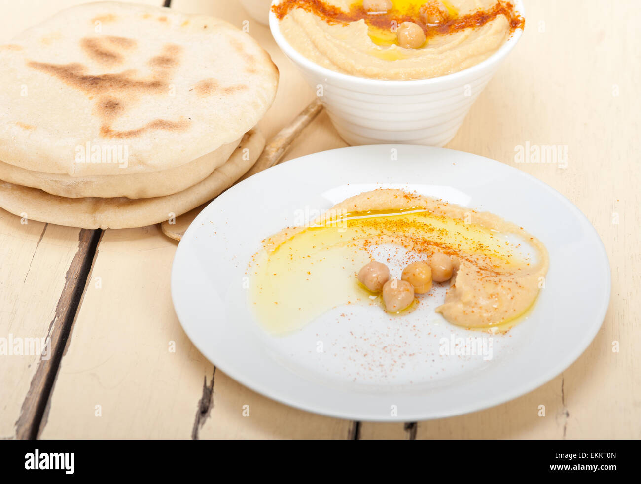traditional chickpeas Hummus with pita bread and paprika on top Stock