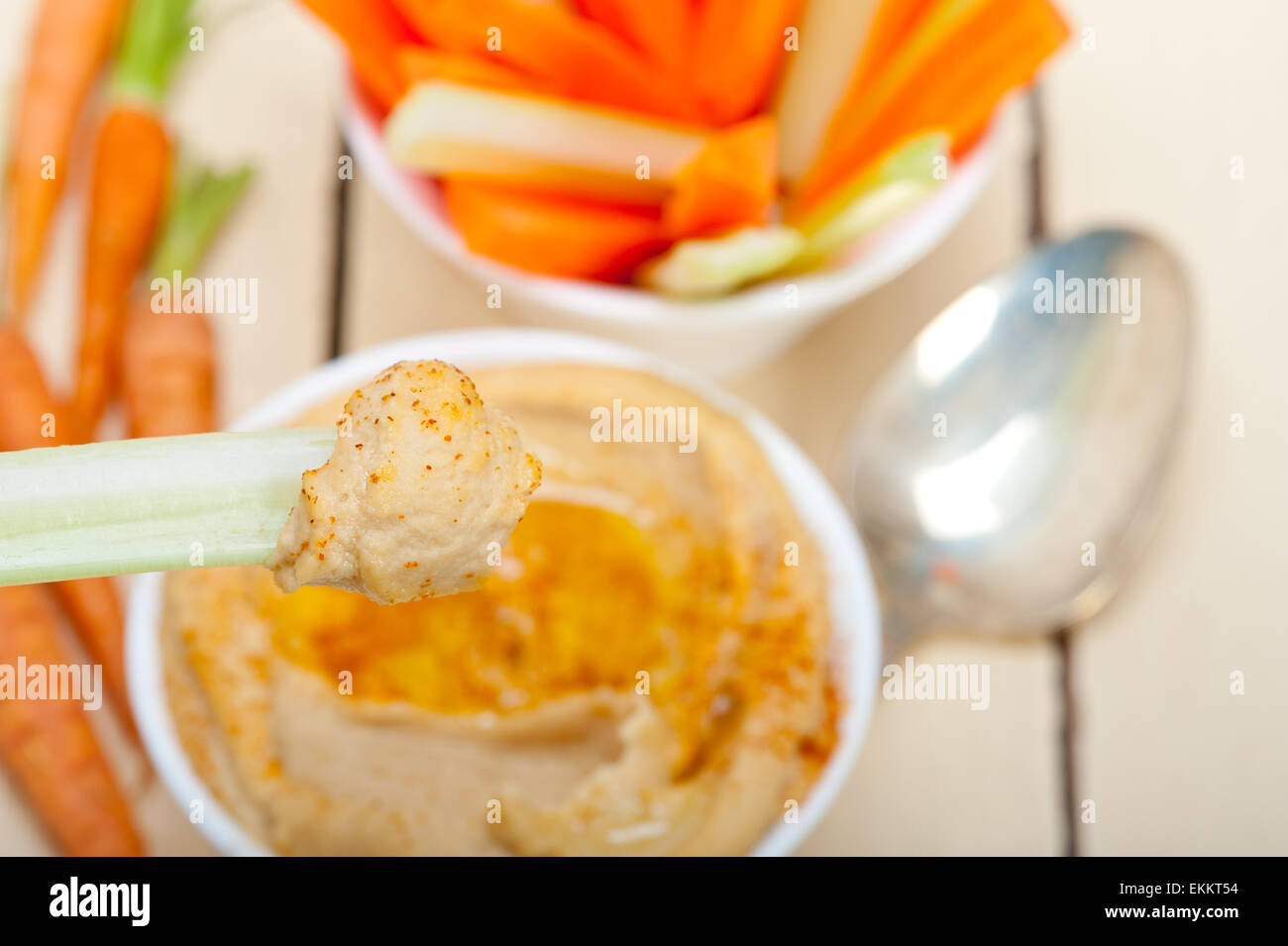 fresh hummus dip with raw carrot and celery arab middle eastent healthy