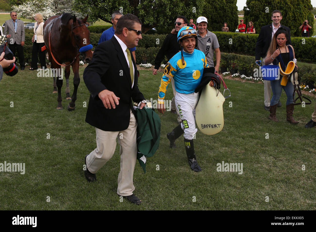 Hot Springs, Arkansas, USA. 11th Apr, 2015. American Pharoah, co-trainer Jimmy Barnes and jockey Victor Espinoza leaving the winners circle after the Arkansas Derby at Oaklawn Park in Hot Springs, AR. Justin Manning/ESW/CSM/Alamy Live News Stock Photo