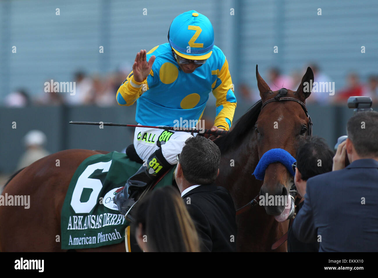 Hot Springs, Arkansas, USA. 11th Apr, 2015. American Pharoah with jockey Victor Espinoza aboard celebrating with co-trainer Jimmy Barnes after winning the Arkansas Derby at Oaklawn Park in Hot Springs, AR. Justin Manning/ESW/CSM/Alamy Live News Stock Photo