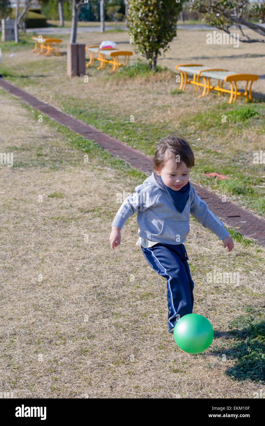 Child Kicking A Ball High Resolution Stock Photography and Images Alamy