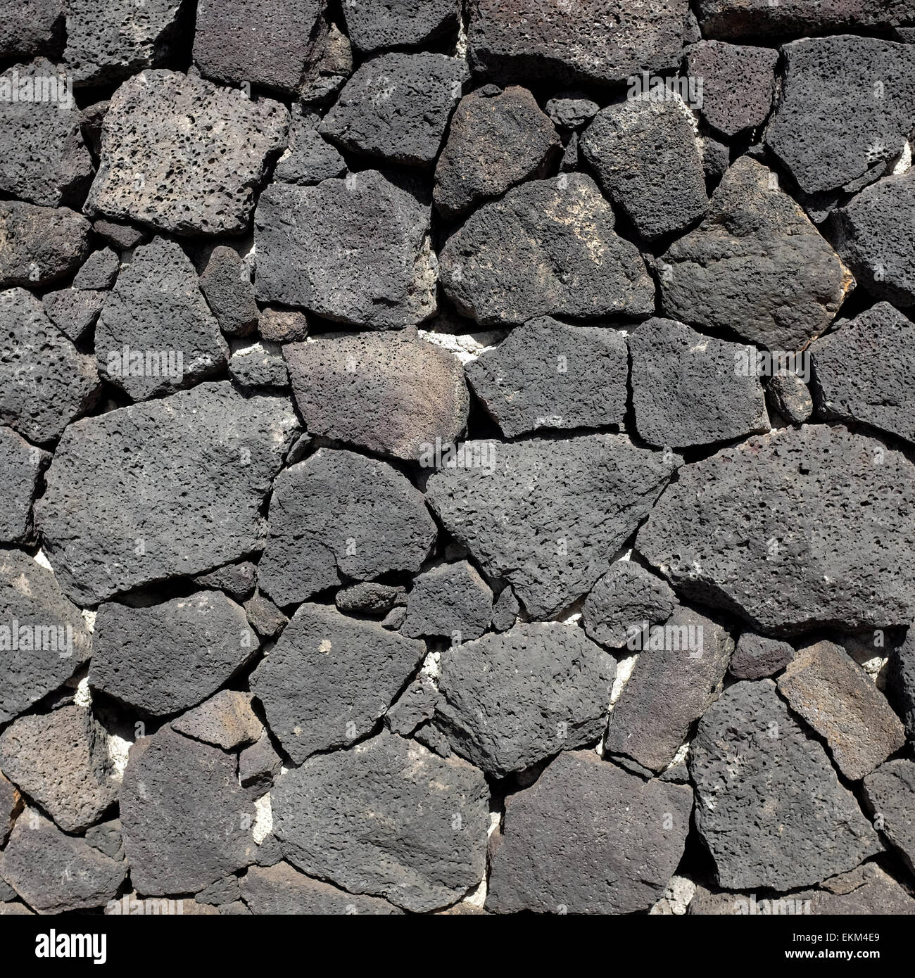 Stone wall made from volcanic rock in Lanzarote Stock Photo