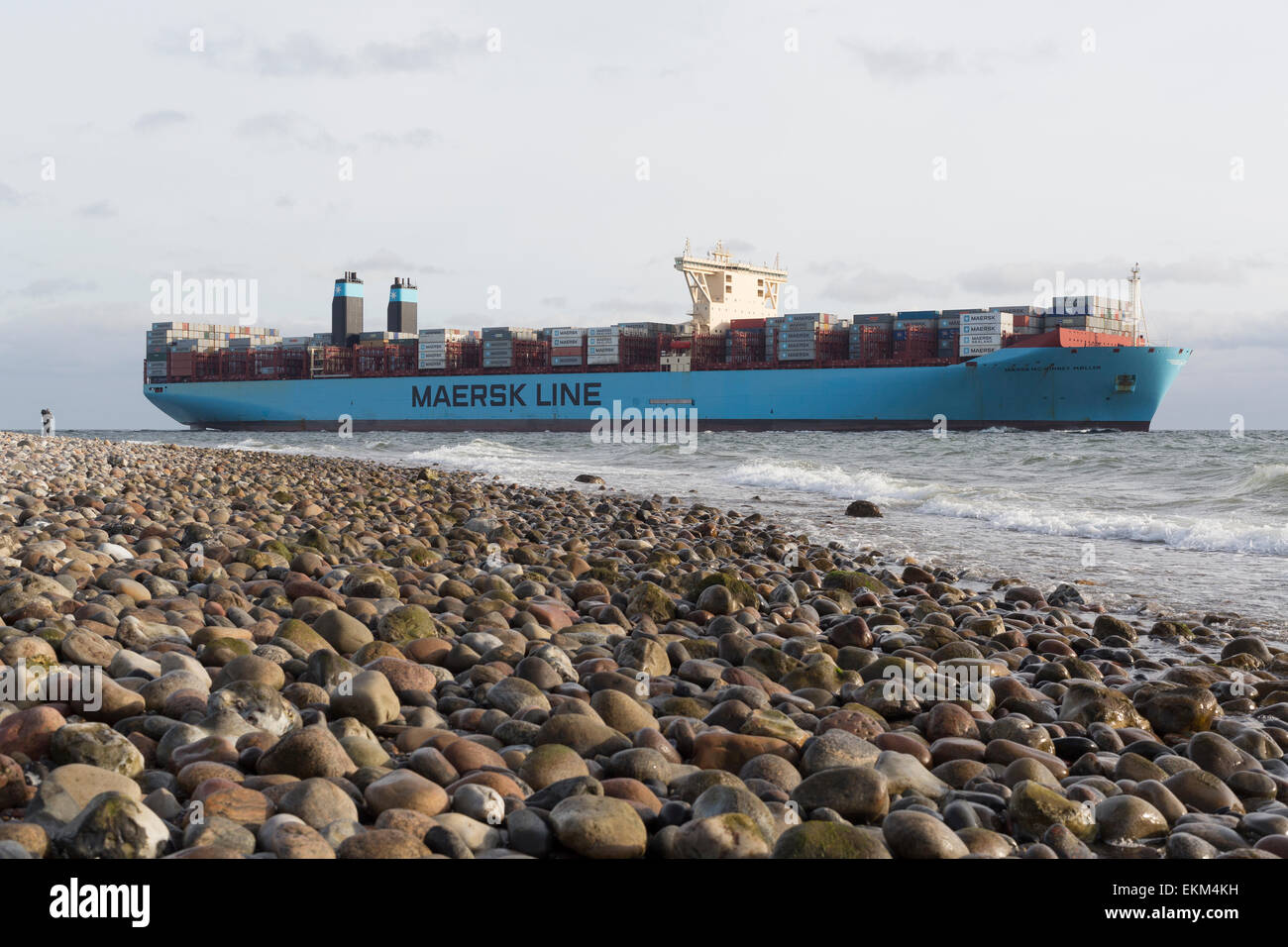 A huge Triple-E-container vessel from Maersk Line passes Sletterhage on its approach to Aarhus. Stock Photo