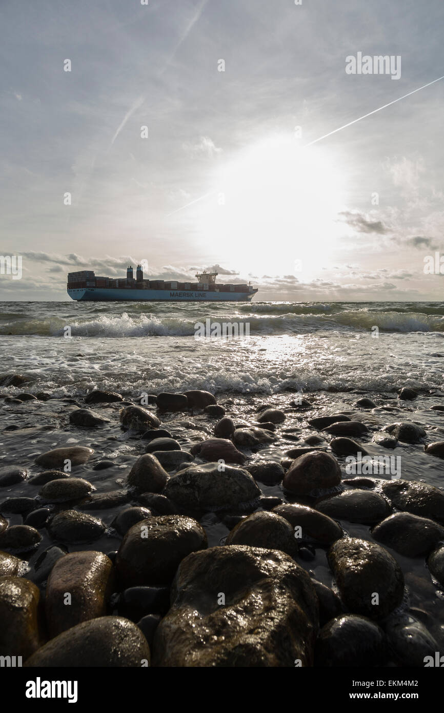 A huge Triple-E-container vessel from Maersk Line passes Sletterhage on its approach to Aarhus. Stock Photo