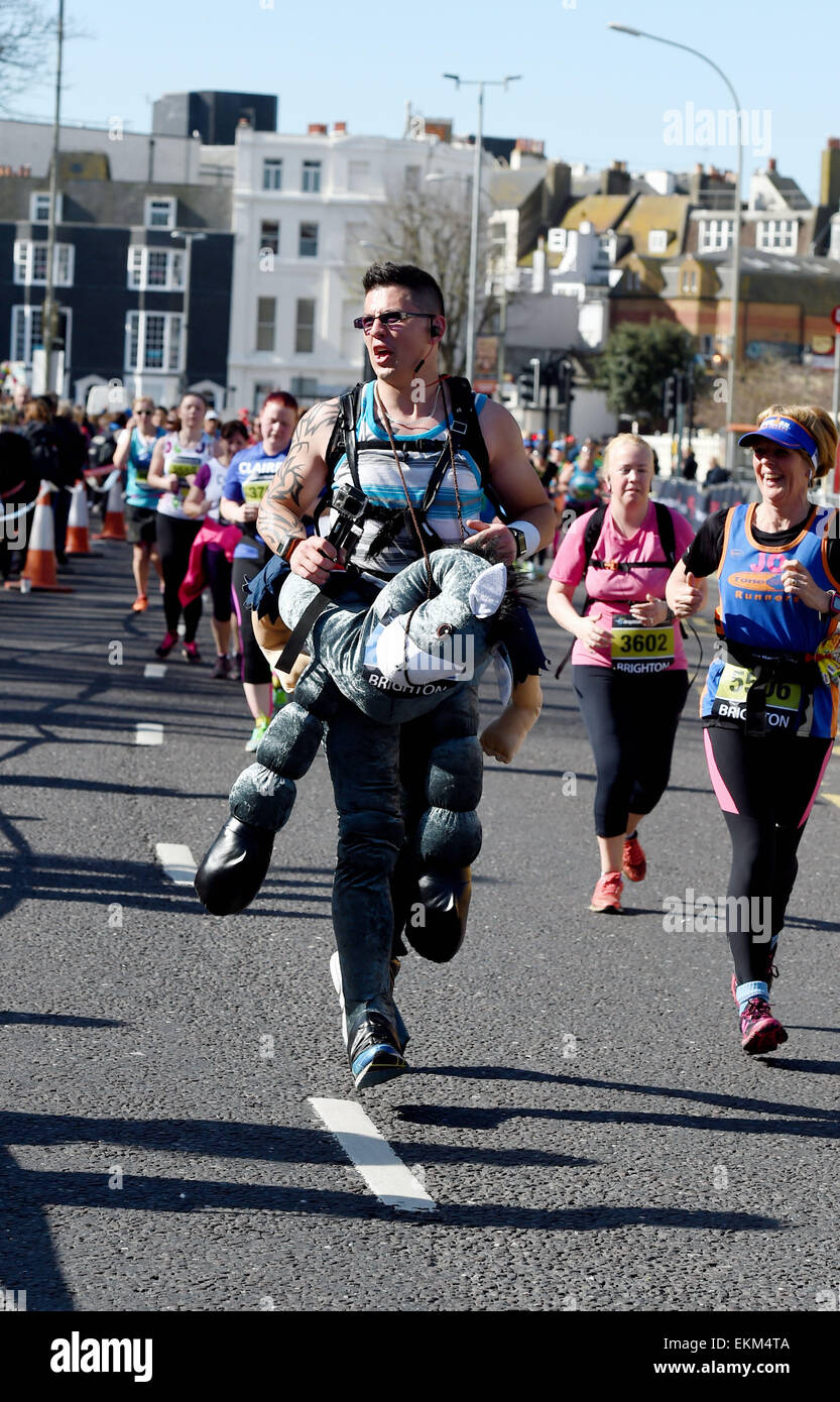 Brighton, UK. 12th April, 2015. Happy runners take part in the Brighton ...