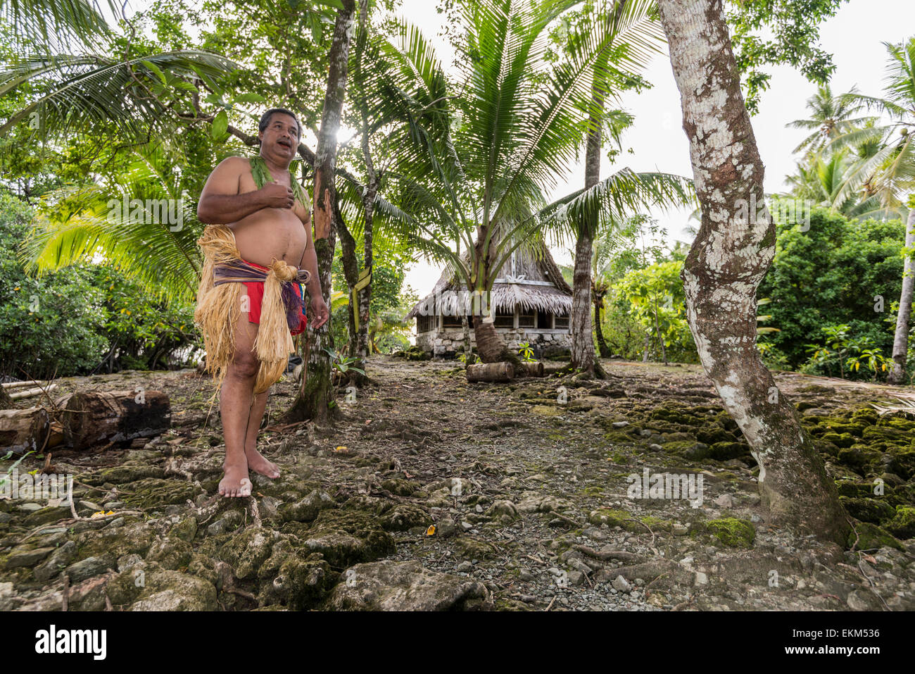 Man, telling the history of the village, in traditional costume. at the village of Yap island. Stock Photo