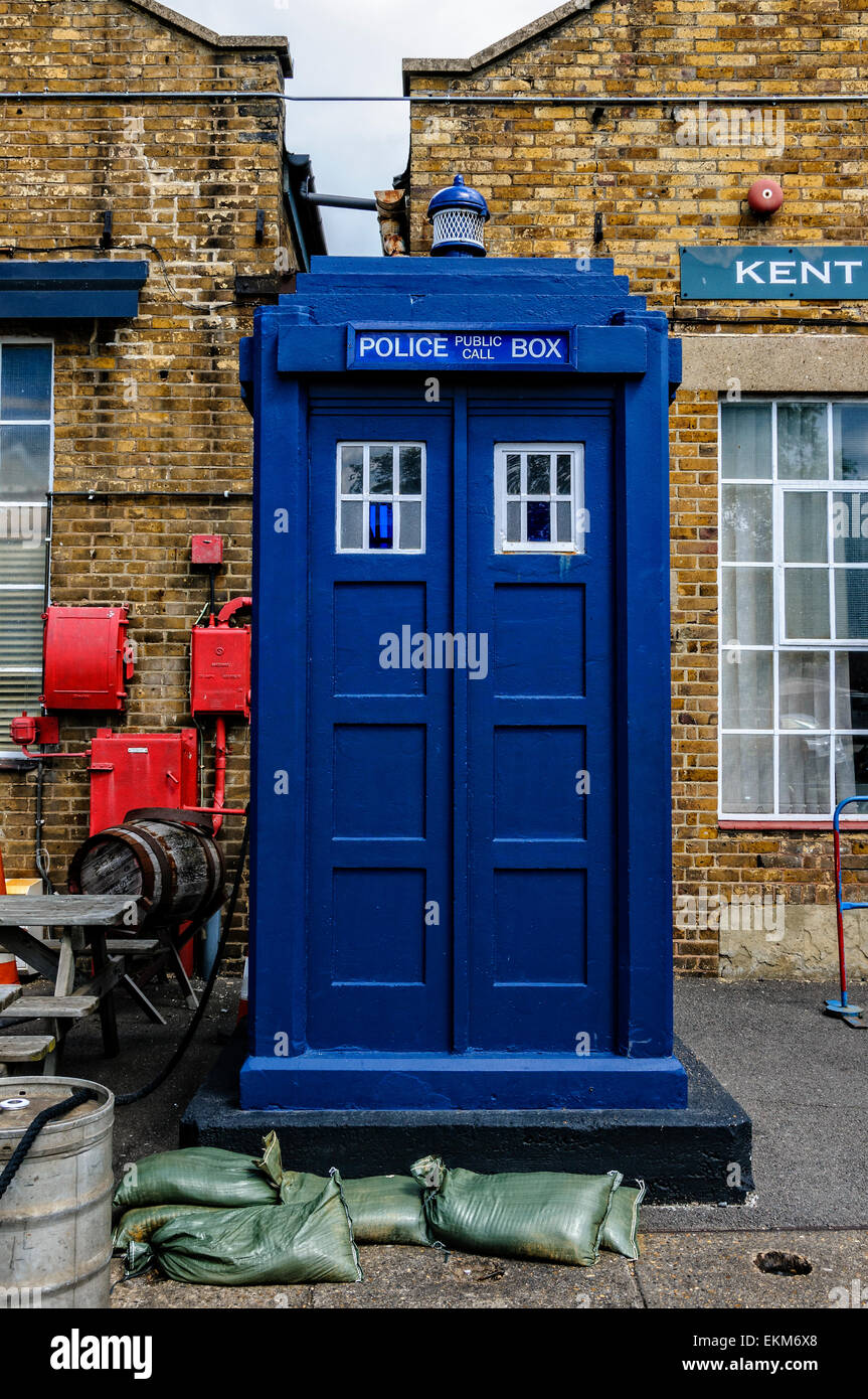 An old fashioned rectangular blue police box standing in front of the Kent police museum at Chatham Historic Dockyard Stock Photo