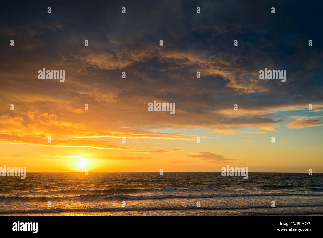 Dramatic sunset and sea, Broadway Beach, Australia Stock Photo - Alamy