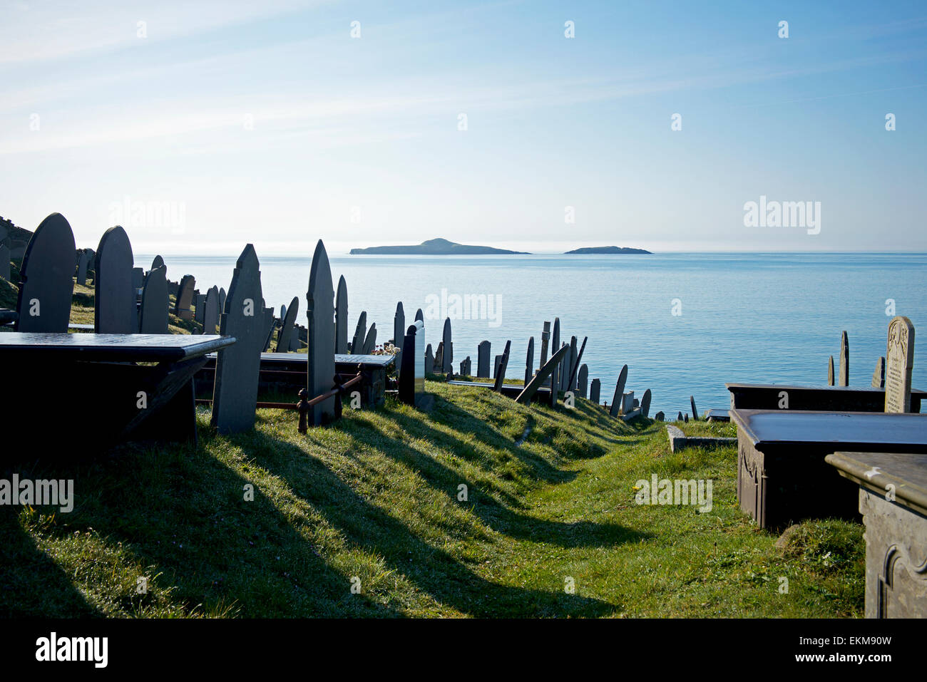 Graves in the churchyard of St Hywyn's Church, Aberdaron, Llyn Peninsular, Gwynedd, North Wales UK Stock Photo