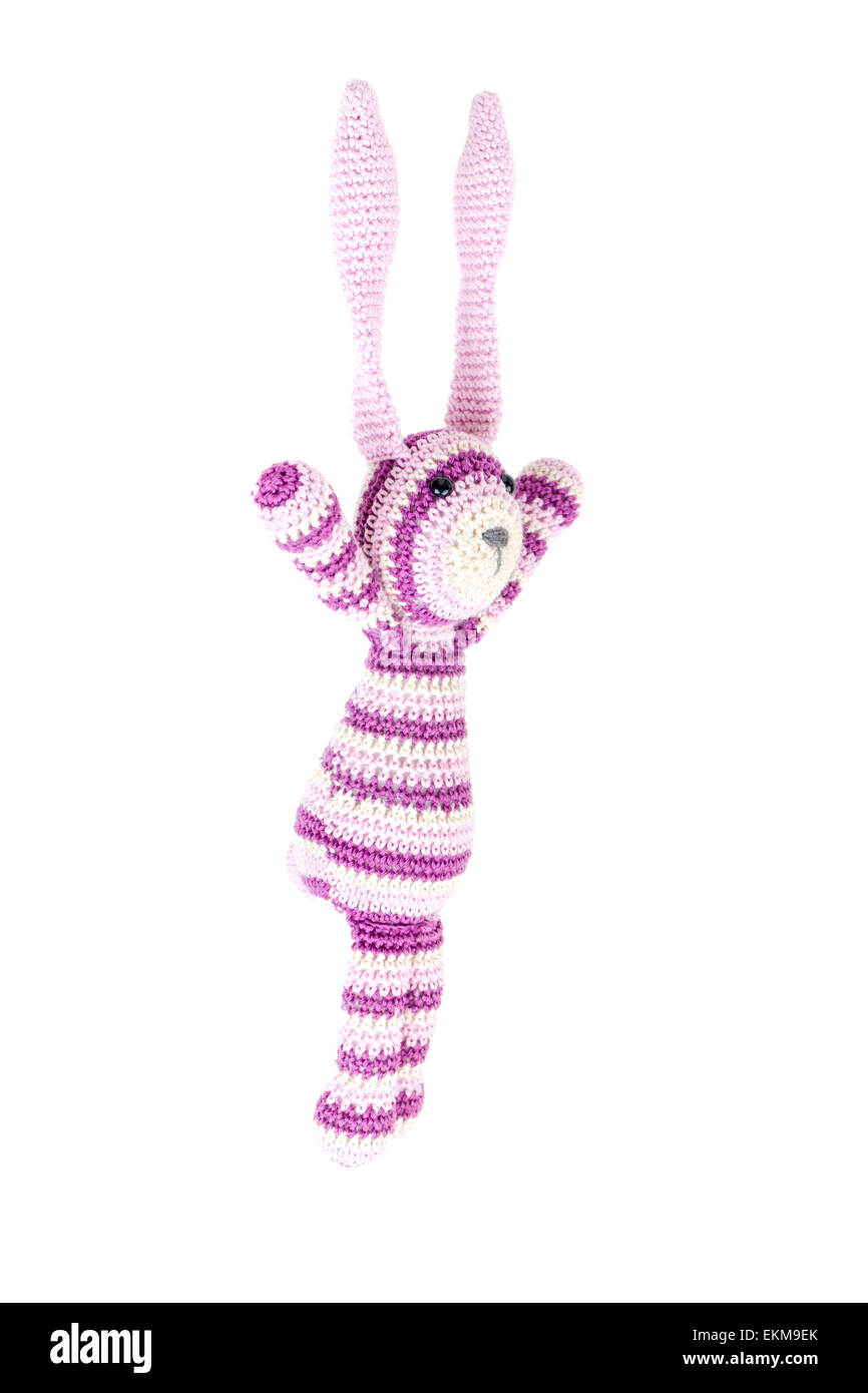 Flying Stuffed Rabbit Funny knitted rabbit toy is flying isolated on white background Stock ...