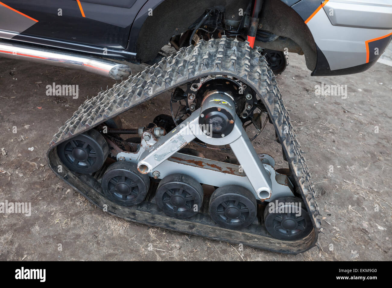 Tracks of all-terrain cross-country vehicle, closeup photo Stock Photo