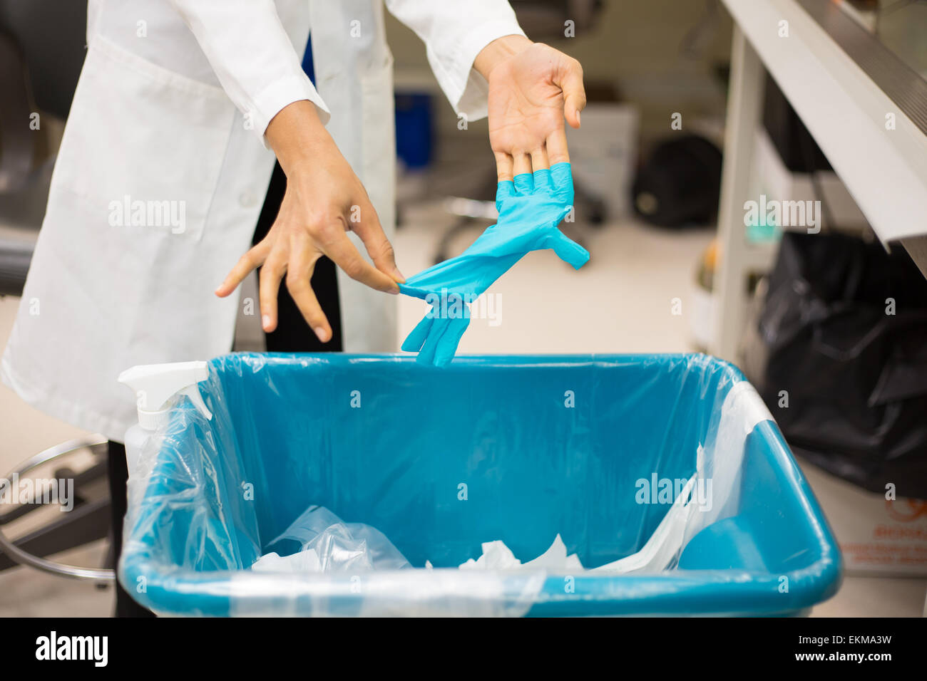 Closeup cropped portrait, healthcare professional throwing away blue