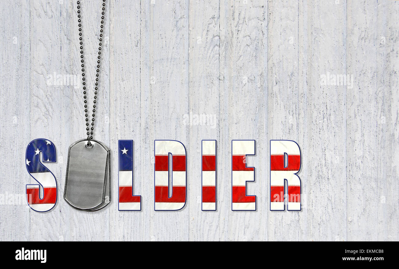 American flag font for patriotic solder with military dog tags on weathered wood. Stock Photo