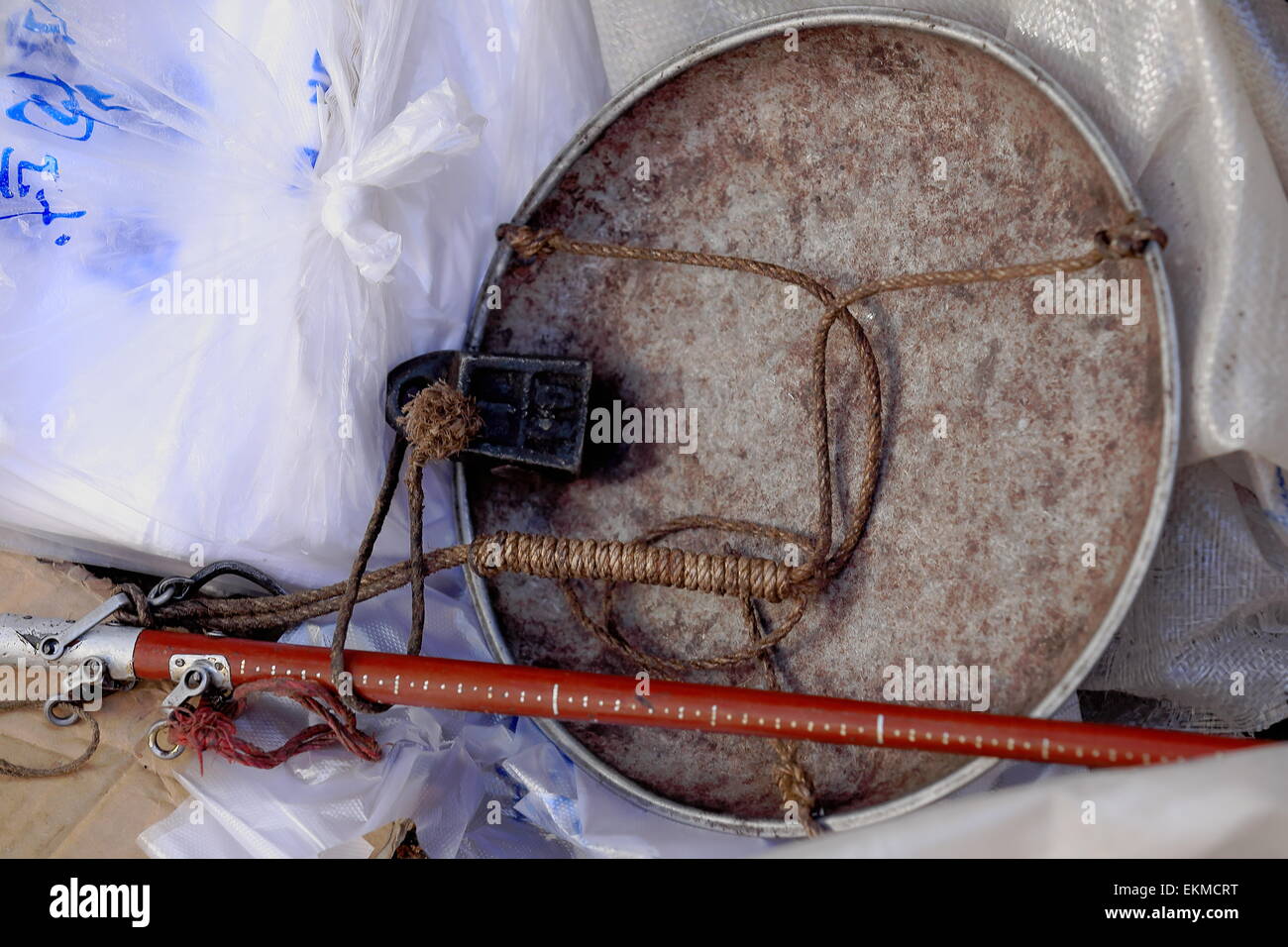 Traditional old metallic steelyardoutside of shop in the street market