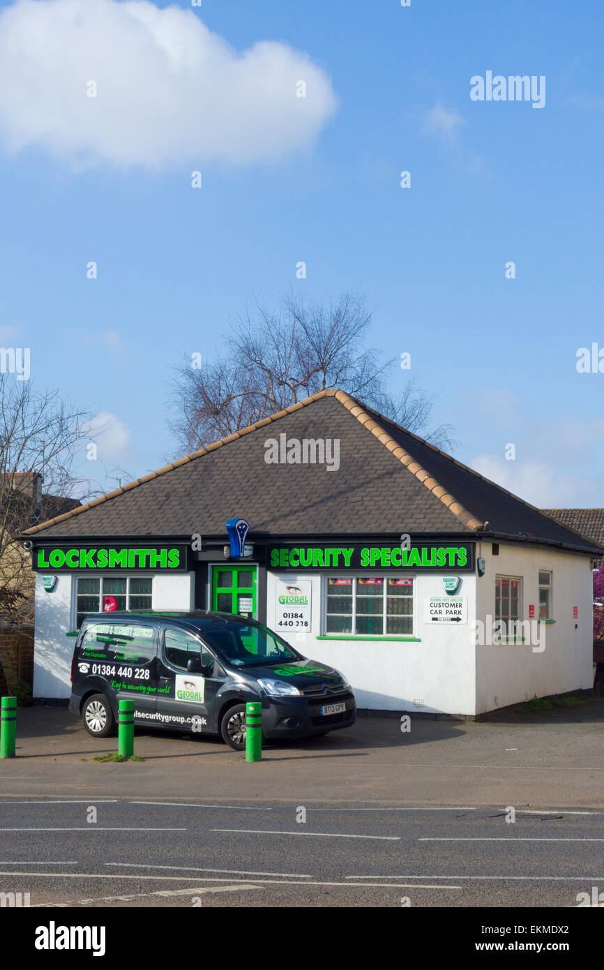 Locksmiths Security Specialists Shop With Citroen Berlingo Van, UK Stock Photo