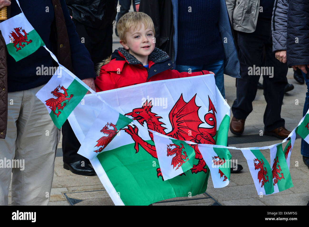 Little boy holding the national flag of Wales at the Pan Celtic Nations International festival in Derry, Londonderry Stock Photo