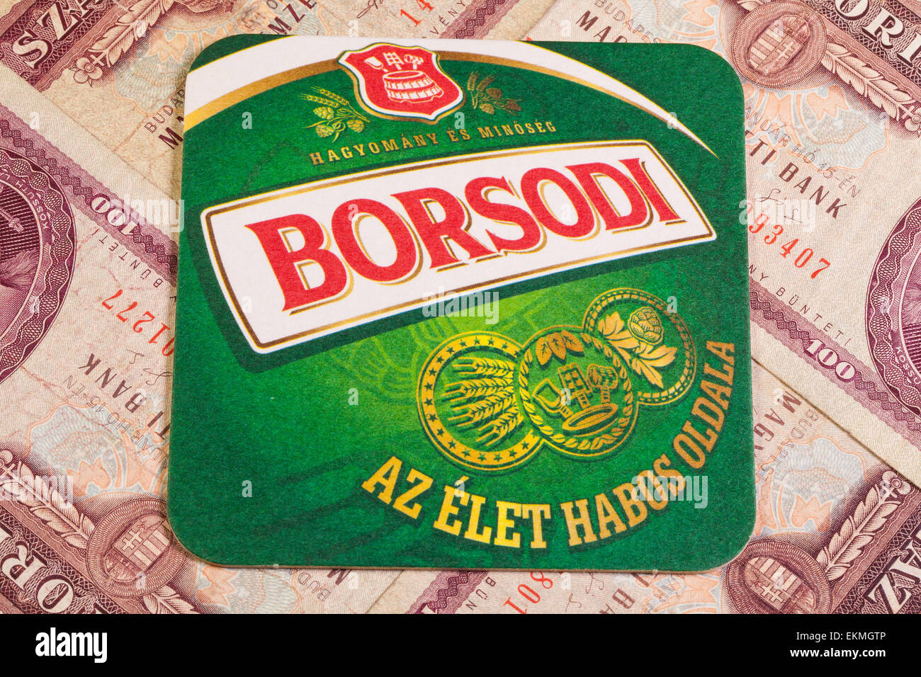 Budapest,Hungary - January 7,2015:Borsodi beermat and old Hungarian money. Stock Photo