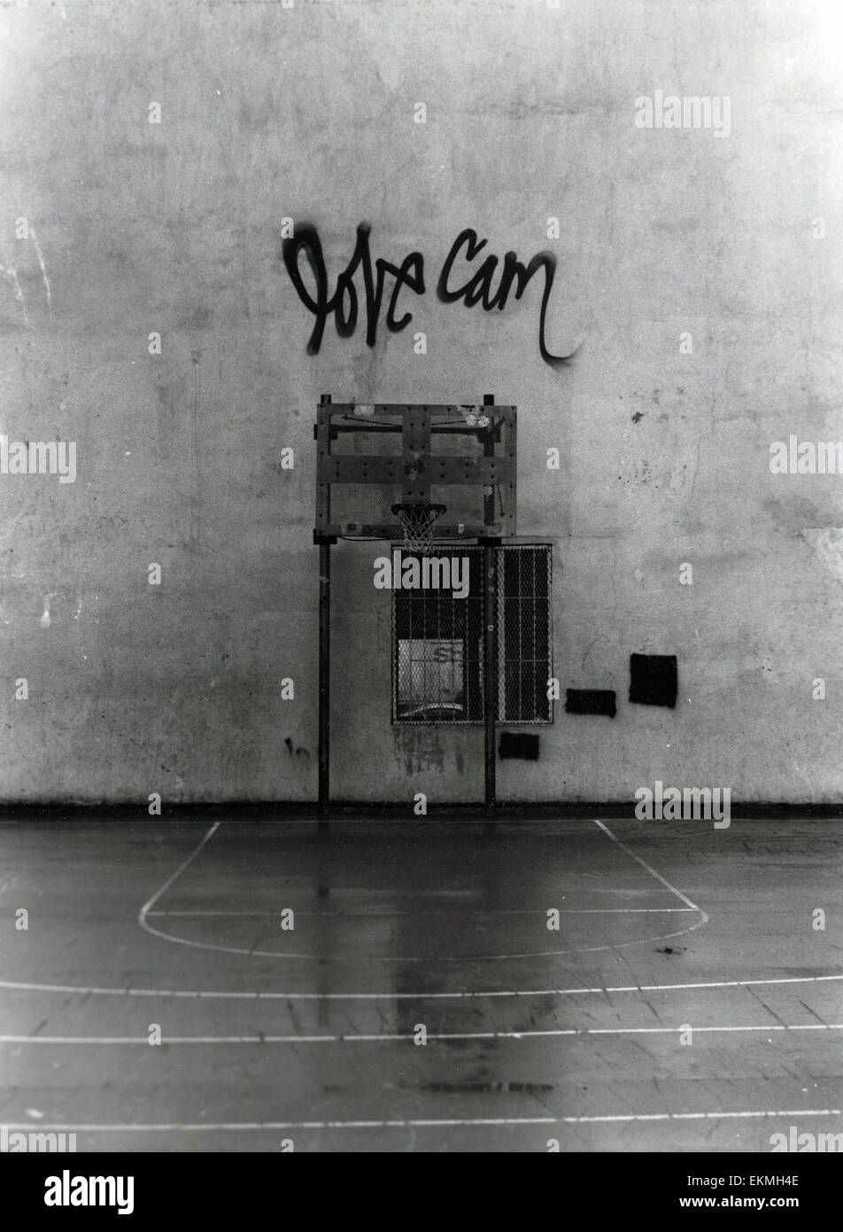 Graffiti Above Basketball Hoop - Spring Street Park NYC Black and White - Film Stock Photo
