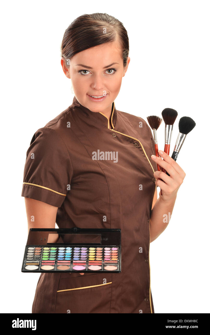 Professional beautician holding brushes Stock Photo