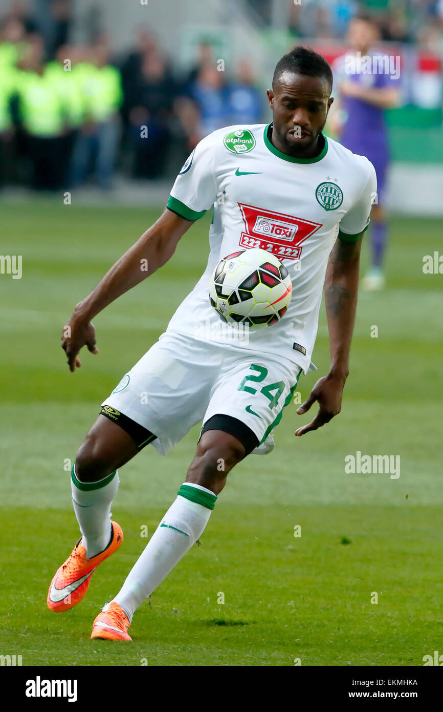 Anderson Esiti of Ferencvarosi TC challenges Luis Jakobi of Ujpest